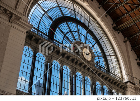 Budapest, Hungary, August 30, 2022. Shot inside the central railway station, called Keleti. Detail of the old clock on the entrance facade. Budapest, Hungary, August 30, 2022. Shot inside the central railway station, called Keleti. Detail of the old clock on the entrance facade. 123760313
