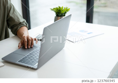 Happy cheerful cute beautiful business woman in office. Happy cheerful cute beautiful business woman in office. 123760345