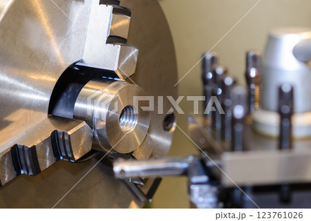 The turning machine operation with metal parts. The turning machine operation with metal parts. 123761026
