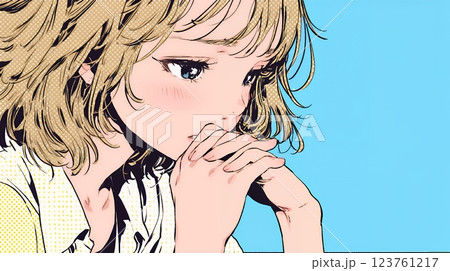 唇を噛んで不安そうな表情をしている若い女性