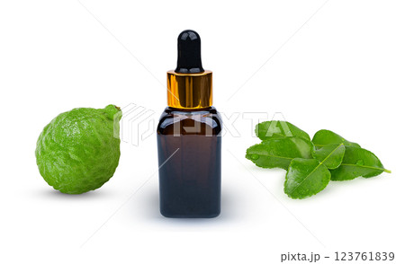 Set of serum bottles of kaffir lime leaves, kaffir lime, Thai herbs for health on white background. Set of serum bottles of kaffir lime leaves, kaffir lime, Thai herbs for health on white background. 123761839