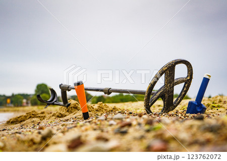 Metal detector with accessories on beach 123762072