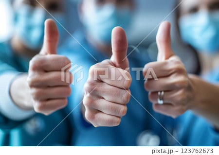 Thumbs up, success and team of doctors for health care support 123762673