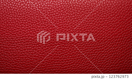 Red leather background. Closeup of eco leather texture Red leather background. Closeup of eco leather texture 123762973