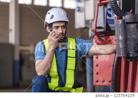 Engineer checking construction process railway and checking work on railroad station . Engineer checking construction process railway and checking work on railroad station . 123764229