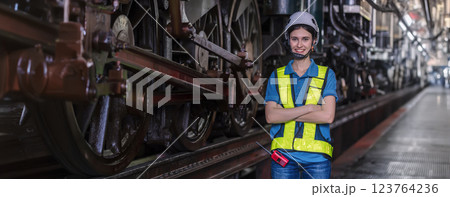 Engineer checking construction process railway and checking work on railroad station .  123764236