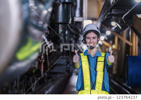 Engineer checking construction process railway and checking work on railroad station .  123764237
