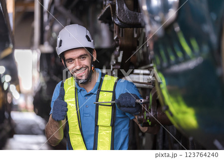 Engineer checking construction process railway and checking work on railroad station .  123764240