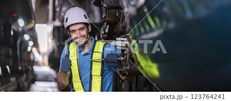 Engineer checking construction process railway and checking work on railroad station .  123764241