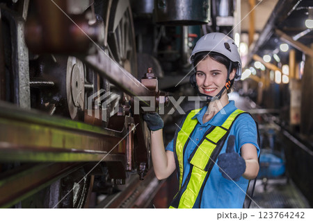 Engineer checking construction process railway and checking work on railroad station .  123764242