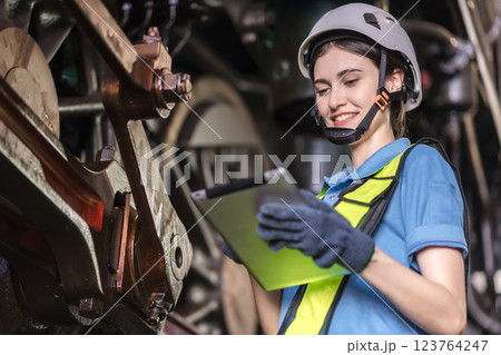 Engineer checking construction process railway and checking work on railroad station . Engineer checking construction process railway and checking work on railroad station . 123764247