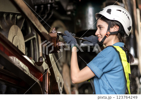 Engineer checking construction process railway and checking work on railroad station .  123764249
