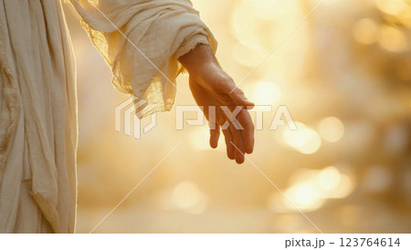Hand of Jesus reaching out with light in spiritual scene, copy space background Hand of Jesus reaching out with light in spiritual scene, copy space background 123764614