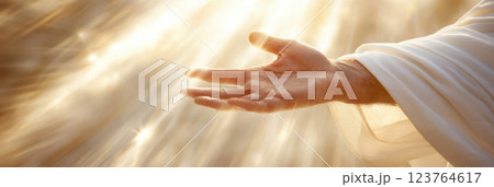 Hand of Jesus reaching out with light in spiritual scene, religious concept background Hand of Jesus reaching out with light in spiritual scene, religious concept background 123764617