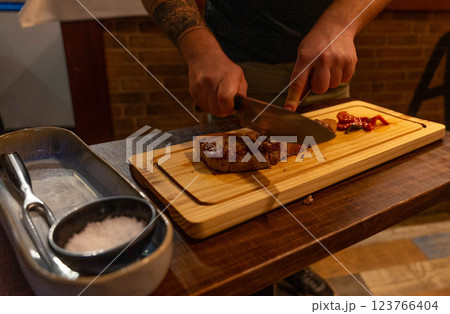 Cutting the meat Cutting the meat 123766404