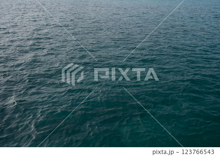 Indian ocean water background in bay on Seychelles islands Indian ocean water background in bay on Seychelles islands 123766543