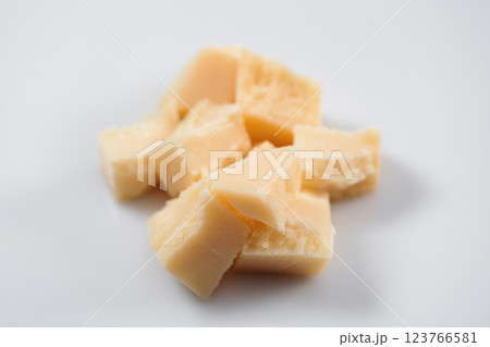 Parmesan cheese chunks on white background 123766581