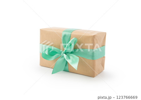 Brown paper gift box with green ribbon isolated on white Brown paper gift box with green ribbon isolated on white 123766669