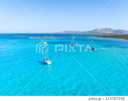 Drone view of a sailing yacht. Vacationing people. Summer time for sea travel.  123767356