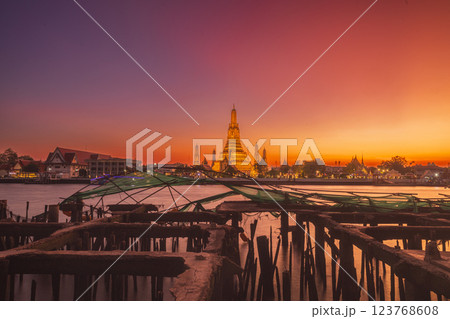 Twilight view of Wat Arun Ratchawararam Ratchawaramahawihan at sunset in bangkok Thailand. Landmark of Along the Chao Phraya River Thailand 123768608