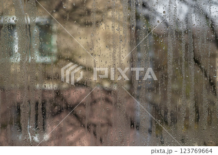 wet glass. a fogged window with water droplets wet glass. a fogged window with water droplets 123769664