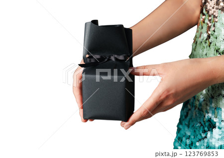 PNG, Black Friday, gift box in hands, isolated on white background. 123769853