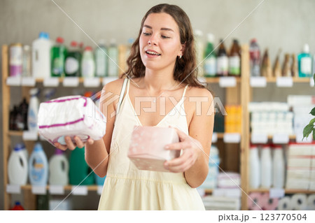 Girl choose woman pads in household shop 123770504