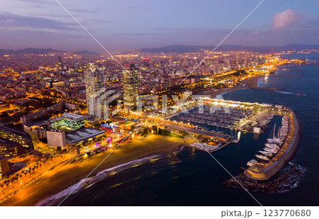 Night aerial view from drones of coast in Barcelona with sea Night aerial view from drones of coast in Barcelona with sea 123770680