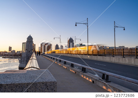 Red Line T train running across Long Fellow Brige over Charles River in Boston, MA 123772686