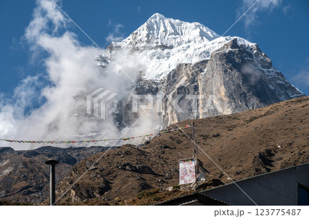 Taboche mountain (6,495 m) a sacred mountains seen from Pangboche village in Sagarmatha national park, Nepal. 123775487