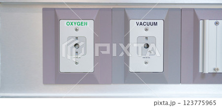 Oxygen and Vacuum Pipeline socket for Patient medical treatment in hospital room. Medical equipment, Emergency, Professional Medical system , Intensive Care Unit and Safety concept Oxygen and Vacuum Pipeline socket for Patient medical treatment in hospital room. Medical equipment, Emergency, Professional Medical system , Intensive Care Unit and Safety concept 123775965