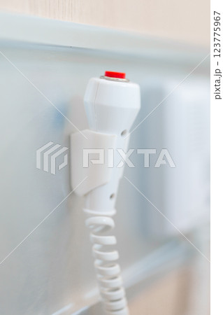 emergency button in hospital room, calling nurse in emergency case. Professional Medical system and Safety Alert 123775967
