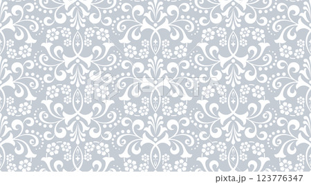 Wallpaper in the style of Baroque. White and gray floral ornament. Seamless vector background. Graphic pattern for fabric, wallpaper, packaging. Ornate Damask flower illustration Wallpaper in the style of Baroque. White and gray floral ornament. Seamless vector background. Graphic pattern for fabric, wallpaper, packaging. Ornate Damask flower illustration 123776347
