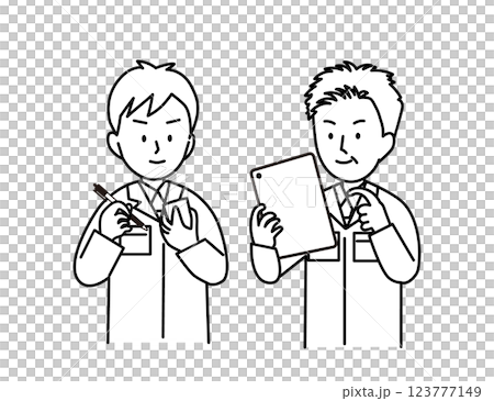 A middle-aged man explaining things on a tablet to a young man in work clothes who is taking notes 123777149