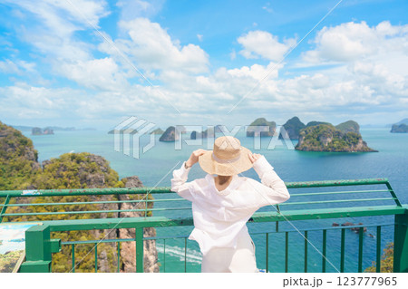 Woman tourist traveling in Krabi, Thailand. happy traveller enjoy and sightseeing view at koh Hong island viewpoint. summer trip, destination, Southeast Asia Travel, vacation and holiday concept Woman tourist traveling in Krabi, Thailand. happy traveller enjoy and sightseeing view at koh Hong island viewpoint. summer trip, destination, Southeast Asia Travel, vacation and holiday concept 123777965