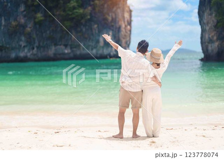 Couple tourist traveling and sightseeing in Krabi, Thailand. happy traveller enjoy on beach at koh Hong island. Honeymoon trip, destination, Southeast Asia Travel, summer vacation and holiday concept Couple tourist traveling and sightseeing in Krabi, Thailand. happy traveller enjoy on beach at koh Hong island. Honeymoon trip, destination, Southeast Asia Travel, summer vacation and holiday concept 123778074