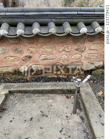 "Water Faucet in a Temple" 123779421