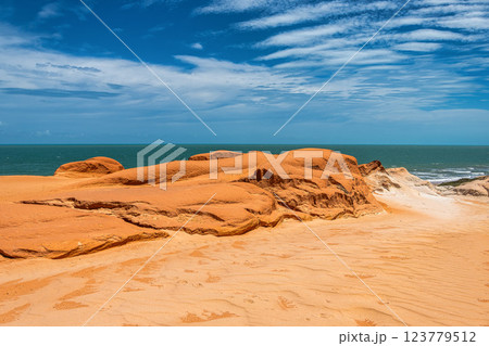 The rock formations at Canoa Quebrada Beach at Canoa Quebrada, state of Ceara, Brazil 123779512