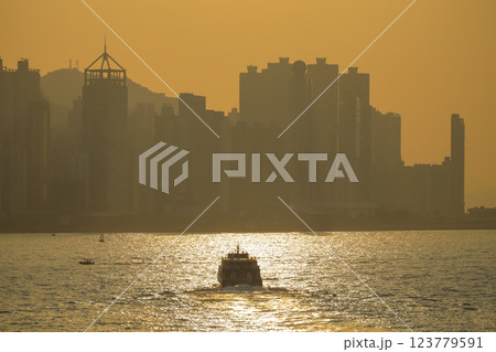 Jan 19 2025 Golden Hour City Skyline Overlooking a Quiet Harbor Jan 19 2025 Golden Hour City Skyline Overlooking a Quiet Harbor 123779591