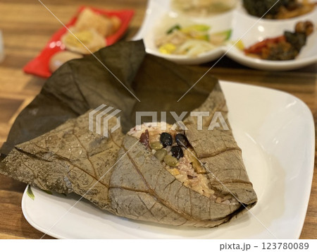 "Fragrant Lotus Leaf Rice: A Traditional Korean Culinary Delight" "Fragrant Lotus Leaf Rice: A Traditional Korean Culinary Delight" 123780089