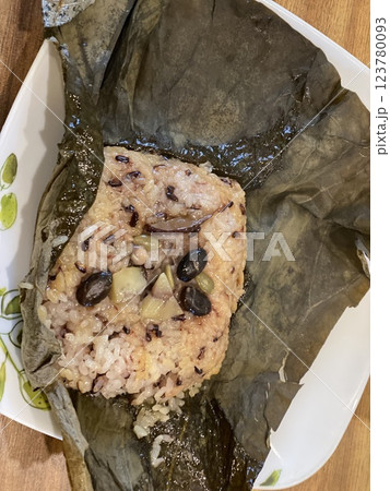 "Fragrant Lotus Leaf Rice: A Traditional Korean Culinary Delight" "Fragrant Lotus Leaf Rice: A Traditional Korean Culinary Delight" 123780093