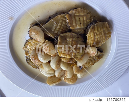 "Abalone with Garlic and Olive Oil: A Savory Seafood Dish" "Abalone with Garlic and Olive Oil: A Savory Seafood Dish" 123780225