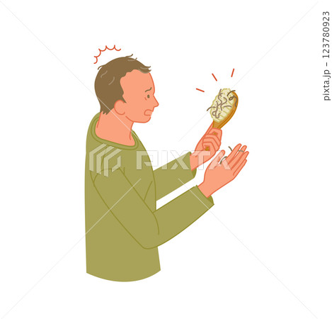 ヘアブラシに付いた髪を見て驚く薄毛の若い男性(抜け毛) ヘアブラシに付いた髪を見て驚く薄毛の若い男性(抜け毛) 123780923