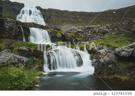 Dynjandi is one the most famous waterfall of the West Fjords of Iceland at summer Dynjandi is one the most famous waterfall of the West Fjords of Iceland at summer 123781559
