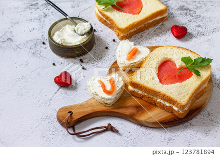 Breakfast for valentine's day or mother's day, toast with salmon and curd cheese with the inscription that I love you. Copy space. Breakfast for valentine's day or mother's day, toast with salmon and curd cheese with the inscription that I love you. Copy space. 123781894