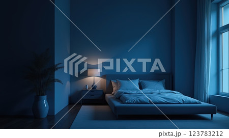 Cozy modern bedroom with soft blue lighting and minimalist decor in evening ambiance 123783212