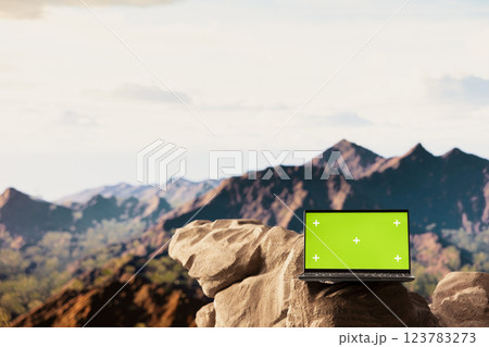 Remote wilderness escape featuring rocky peaks with green screen and lush greenery. This picturesque landscape is a paradise for nature lovers and trekking enthusiasts searching for solitude. 123783273