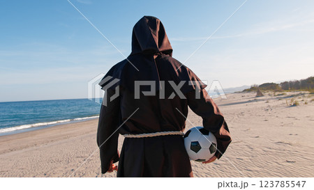 The Soccer Player Monk At The Beach  123785547