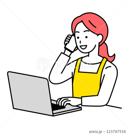 ノートパソコンを操作しながら電話するエプロン姿の女性 123787558