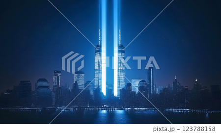 A subtle and artistic representation of the twin towers in the New York skyline with a glowing sunrise background 123788158